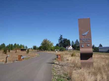 Road into the refuge - entrance gate - no sidewalk - take gravel trail from the bus stop Road into the refuge - entrance gate - no sidewalk - take gravel trail from the bus stop